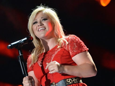 Kelly Clarkson performs during the 2013 CMA Music Festival on Saturday at LP Field in Nashville.