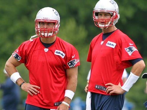 Tim Tebow will now enjoy quarterback tutorials from two-time NFL MVP Tom Brady, right.
