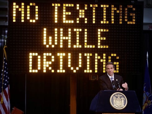 New York Gov. Andrew Cuomo speaks during a news conference to announce the increase in penalties for texting while driving, May 31, 2013, in New York.