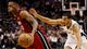 Game 3 in San Antonio: Spurs 113, Heat 77 - Heat guard Norris Cole blows by Spurs guard Cory Joseph.