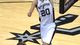 Game 3 in San Antonio: Spurs 113, Heat 77 - Spurs guard Manu Ginobili throws down a dunk over Heat guard Dwyane Wade.
