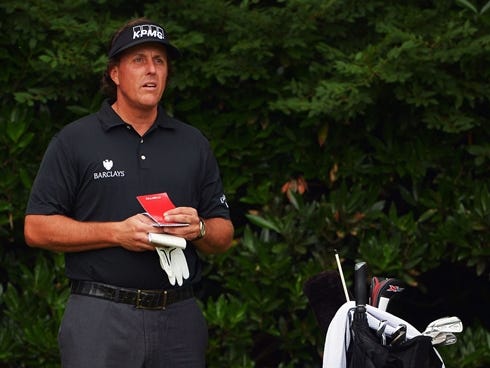 Phil Mickelson waits on the 11th tee to begin the first round of the U.S. Open.