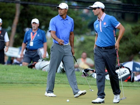 Tiger Woods and Adam Scott on the first during the first round of the 113th U.S. Open.