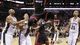 Game 4 in San Antonio:  Miami Heat center Chris Bosh dunks the ball ahead of San Antonio Spurs Boris Diaw, Danny Green and Tim Duncan during the first half.