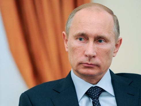 Russia's President Vladimir Putin, shown in 2013, didn't steal Robert Kraft's Super Bowl ring in 2005, a spokesman said.