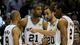 Game 5 in San Antonio: Spurs 114, Heat 104 - San Antonio Spurs shooting guard Manu Ginobili (20) talks to Tony Parker (9) as Tim Duncan (21) and Kawhi Leonard (2) listen in against the Miami Heat.