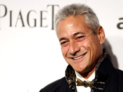 In this Oct. 27, 2011 file photo,  Olympic diving champion Greg Louganis arrives at amfAR's Inspiration Gala in Los Angeles. Louganis plans to get married this fall.