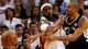 Game 6 in Miami: Heat 103, Spurs 100 (OT) - San Antonio Spurs point guard Tony Parker (9) passes against the defense of Miami forward LeBron James.