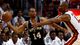 Game 6 in Miami: Heat 103, Spurs 100 (OT) - San Antonio Spurs point guard Gary Neal (14) passes against Miami Heat center Chris Bosh.