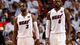 Game 6 in Miami: Heat 103, Spurs 100 (OT) - Dwyane Wade and LeBron James look on during the second quarter.