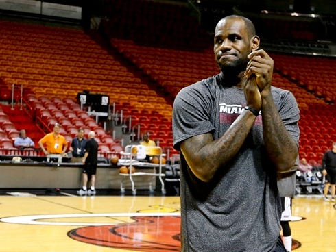 Heat forward LeBron James warms up before practice Wednesday, with Game 7 of the NBA Finals looming.