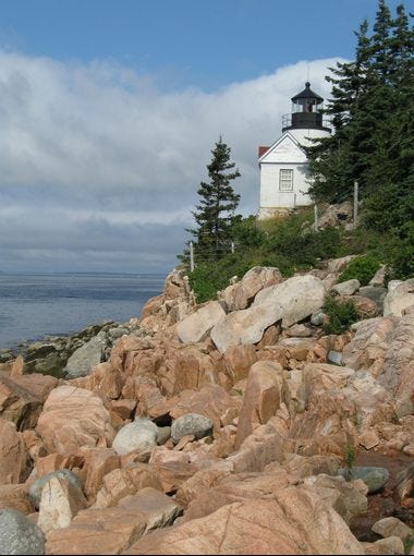 Bass Harbor Head Lighthouse at Acadia National Park in Maine offers camping with salty sea breezes.