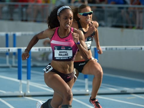 Brianna Rollins, left, wins the 100-meter hurdles ahead of Lolo Jones.