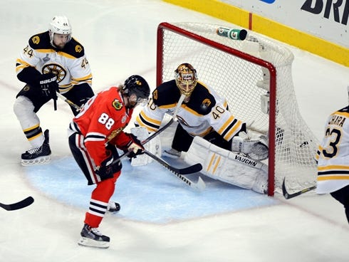 Chicago Blackhawks right wing Patrick Kane scores past Boston Bruins goalie Tuukka Rask during the second period.