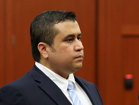 George Zimmerman stand as the selected jurors enter the courtroom during his trial in Seminole circuit court in Sanford, Fla., Thursday.