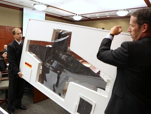 Assistant state attorneys John Guy, right, and Richard Mantei present Trayvon Martin's hooded sweatshirt as evidence during George Zimmerman's trial in Seminole circuit court in Sanford, Fla.