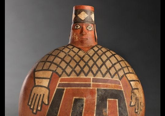 A painted Wari lord on a flask.