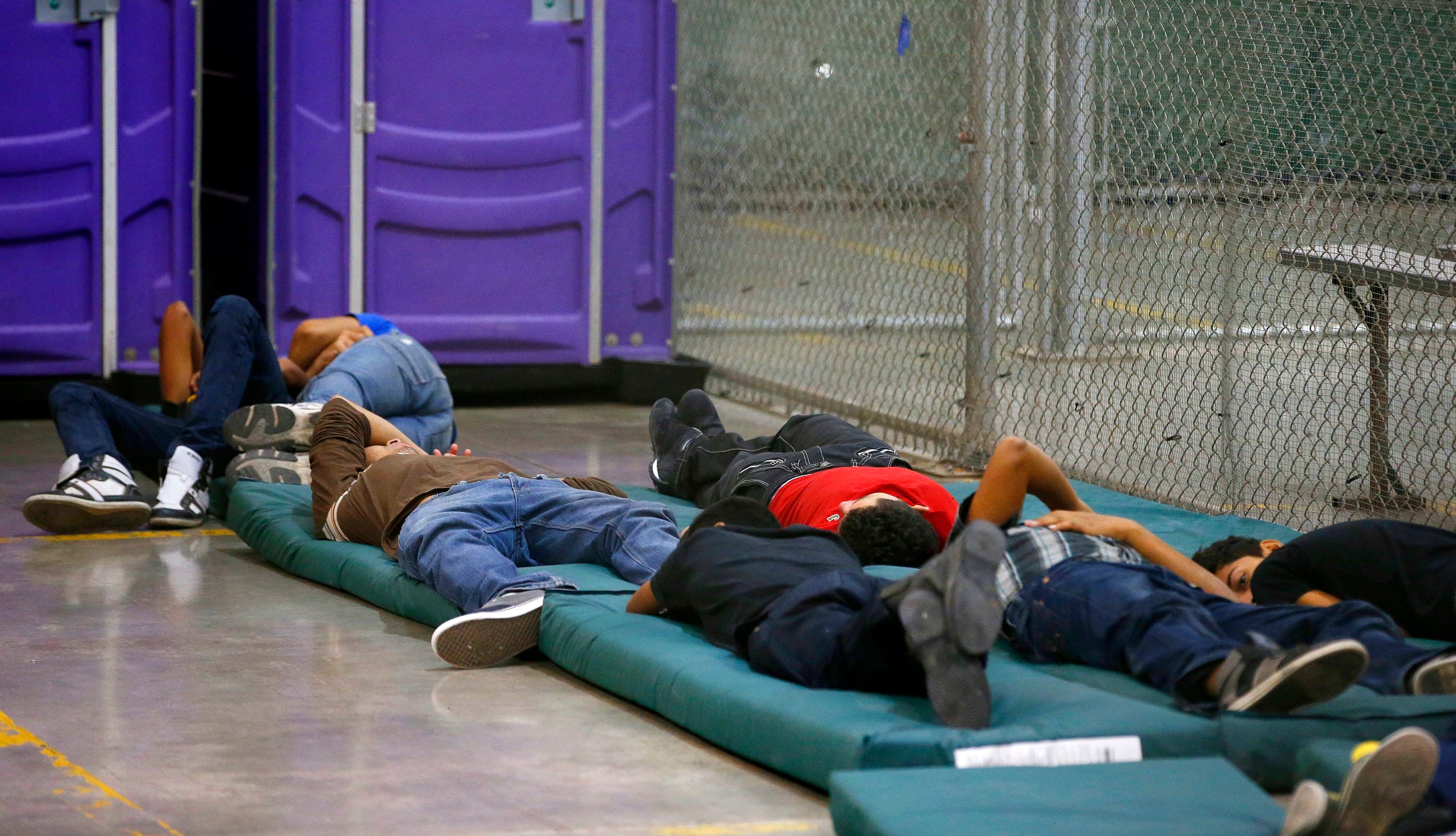 http://www.gannett-cdn.com/media/USATODAY/USATODAY/2014/06/18/1403127721017-AP-Immigration-Overload-042.jpg