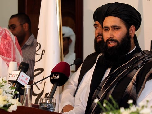 Muhammad Naeem, a representative of the Taliban speaks during a press conference at the official opening of their office in Doha, Qatar, on June 18, 2013.