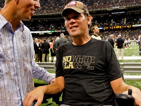Joe Unitas son of former NFL quarterback Johnny Unitas greets former New Orleans Saints defensive back Steve Gleason prior to kickoff of a game against the San Diego Chargers at the Mercedes-Benz Superdome. Mandatory Credit: Derick E. Hingle-US PRESS