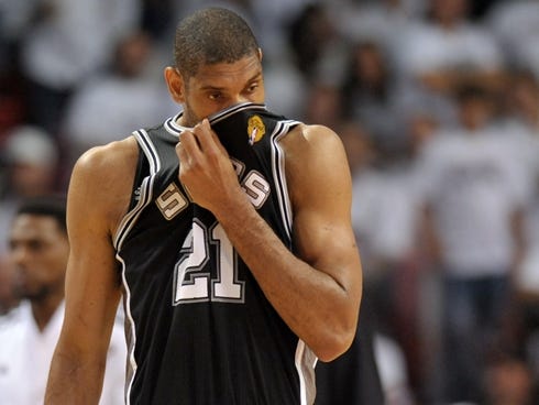 Jun 20, 2013; Miami, FL, USA; San Antonio Spurs power forward Tim Duncan (21) reacts during the fourth quarter of game seven in the 2013 NBA Finals against the Miami Heat at American Airlines Arena. Mandatory Credit: Steve Mitchell-USA TODAY Sports O