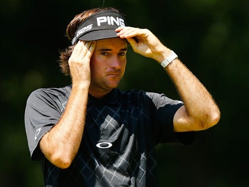 Bubba Watson stands on the 8th green during the final round of the 2013 Travelers Championship.