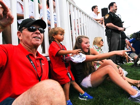 Charlie Woods watches dad win, in person, for the first time.