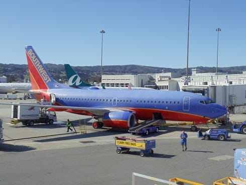 Southwest and AirTran aircraft at gates at San Francisco International Airport on Nov. 8, 2010.