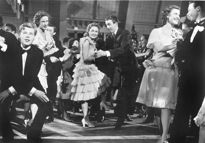 Donna Reed (center left) and Jimmy Stewart (center right) in the center-right famous dance scene "It's a wonderful life."