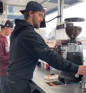 Matthew Koontz (right) and Davidson Reese will make Ice Blondie in January with the first seven brew coffees in Greenville, South Carolina.