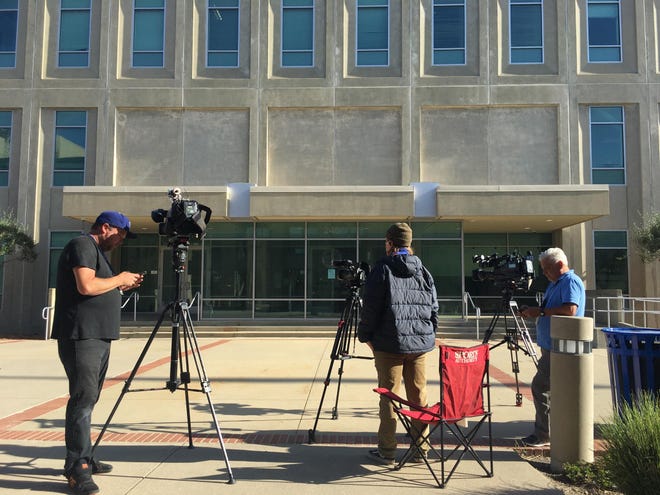 Videographers settled Monday outside the Monterey County Superior Court in Salinas when initial statements begin at the trial of Paul and Ruben Flores for the 1996 murder of Stockton student Kristin Smart.