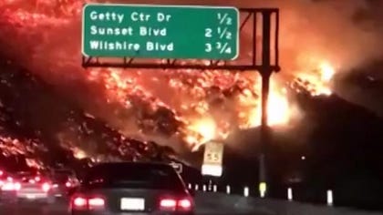 Dramatic L.A. wildfire video looks like driving into hell