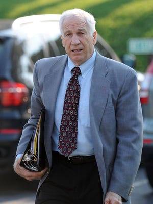 FILE -- Jerry Sandusky arrives at the Centre County Courthouse to hear closing arguments in the Jerry Sandusky trial.