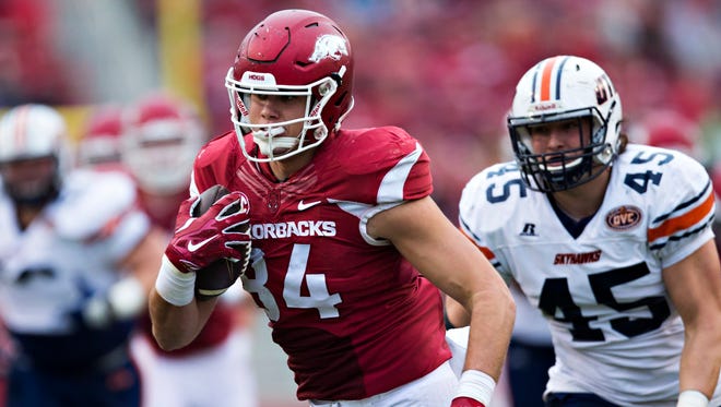 Arkansas tight end Hunter Henry runs the ball after catching a pass during a game against the UT Martin Skyhawks at Razorback Stadium.