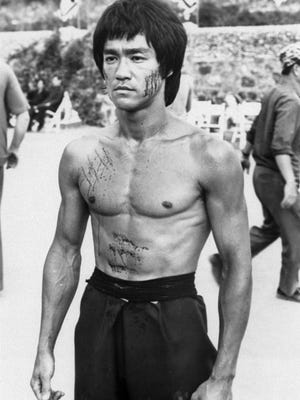 Bruce Lee is shown in a scene from the 1973 film 'Enter the Dragon'.