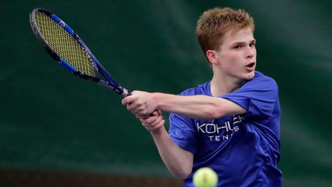 Kohler's Casey Johnson hits a backhand in a Division 2 semifinal at the WIAA boys state individual tennis tournament Saturday at Nielsen Tennis Stadium in Madison.