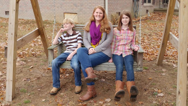 Heather Wittman, center, with her children C.J. Wittman, left, and Kennadee Wittman in 2016 and prior to her cancer diagnosis.
