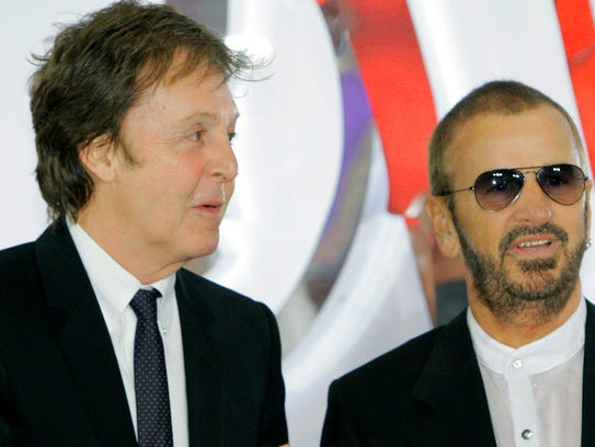 McCartney and Starr attend the first anniversary of