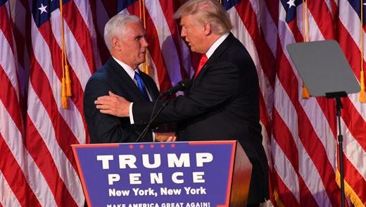 President-elect Donald Trump greets Vice President-elect Mike Pence as he speaks to his supporters at New York Hilton Midtown on election night.