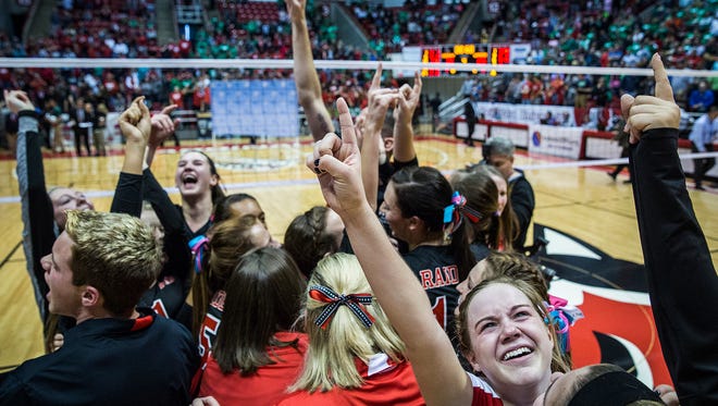 Wapahani's celebrates a State Championship win against Speedway at Worthen Arena Saturday, Nov. 7, 2015. 