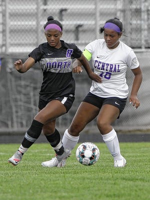 Central's Kassidy Stanley battles North's Avery Bowden for the ball Aug. 21. Stanley is helping to lead a deep group of midfielders for the Tigers.