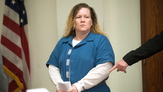 Susan Hyland of Beverly, who is charged with the fatal hit-and-run of 16-year-old Quason Turner of Pennsauken, enters a courtroom in Camden County Superior Court on Thursday for sentencing.