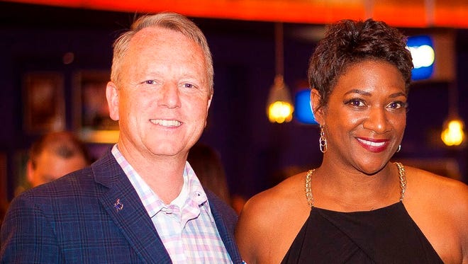Citizens Bank President Rick Hampson and Big Brothers Big Sisters CEO Jeannine Gant.