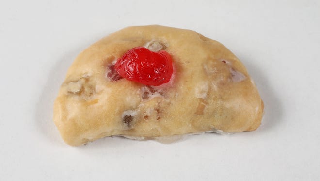 Stollen cookies have the candied fruit, the glaze, the cherry on top and an almond paste filling.