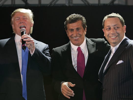 Donald Trump, Tevfik Arif and Felix Sater attend the