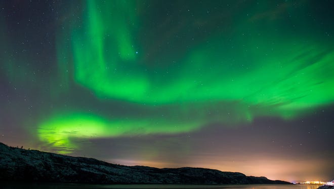 The Aurora Borealis, also known as the Northern Lights, above Kirkenes, Norway.