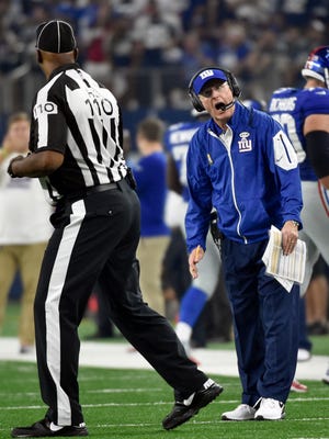 New York Giants head coach Tom Coughlin shouts to an official during a game against the Cowboys last month.