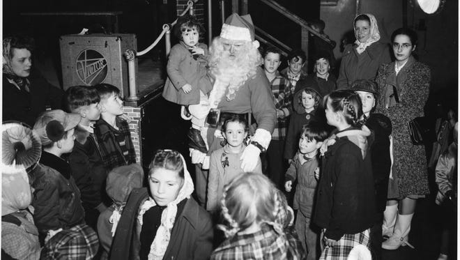 Craven Center in Bremerton hosted a yearly children’s Christmas party. This one, held on Dec. 16, 1948, featured Santa, and each child was given a mesh stocking filled with treats. To see more photos from the Kitsap County Historical Society Museum archives, visit www.facebook.com/kitsaphistory, or stop by the museum at 280 Fourth St. in Bremerton. Call 360-479-6226 for information.