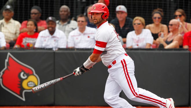 University of Louisville's Colby Fitch (42) hist a triple against Florida State during their game at Patterson Stadium in Louisville, Kentucky.       May 9, 2015