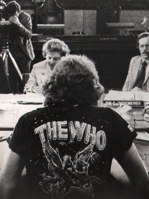 Jerry Havlin of White Oak, testifies before Cincinnati City Council committee on the crush of concertgoers outside the arena that took 11 lives. The battle for survival outside the arena's doors was "a living hell," he said. Council members, from left, are Gerald N. Springer, Bobbie Sterne and Guy C. Guckenberger.